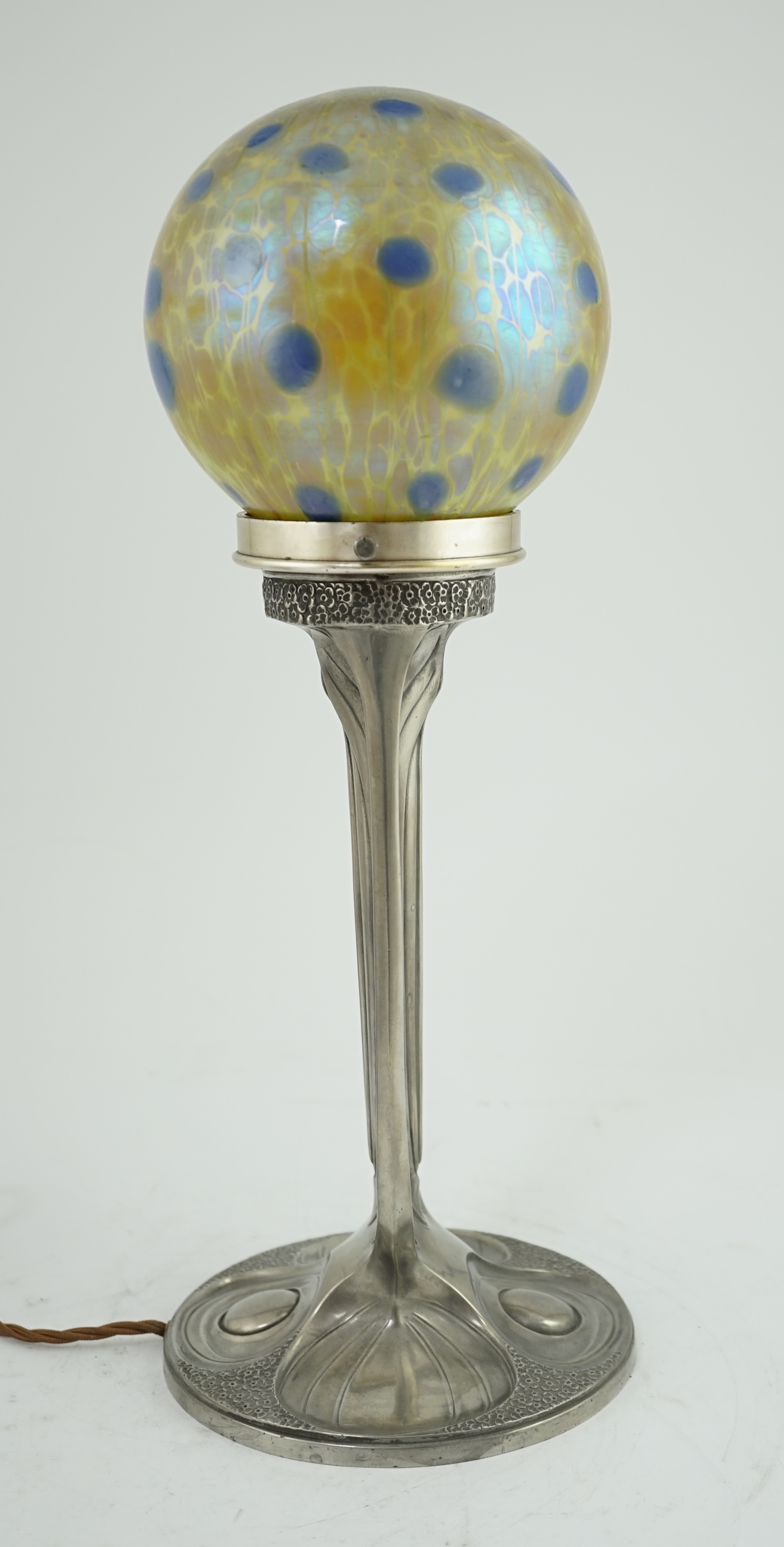 An Art Nouveau Orivit pewter table lamp with Loetz iridescent glass globular shade